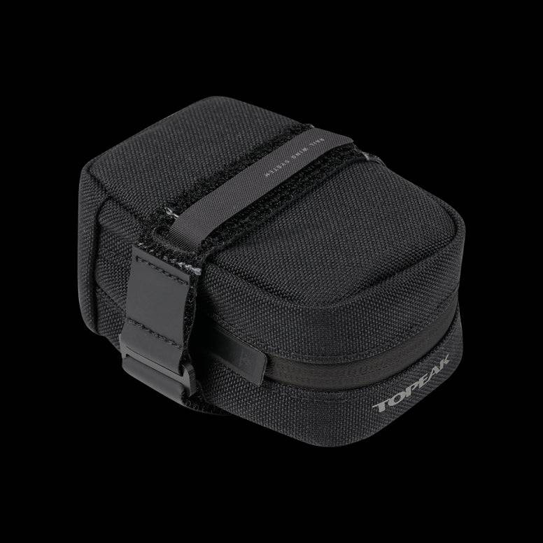 Topeak Elementa seatbag attached to a bike saddle, compact bike saddle bag for tools and inner tubes, made for cycling accessories