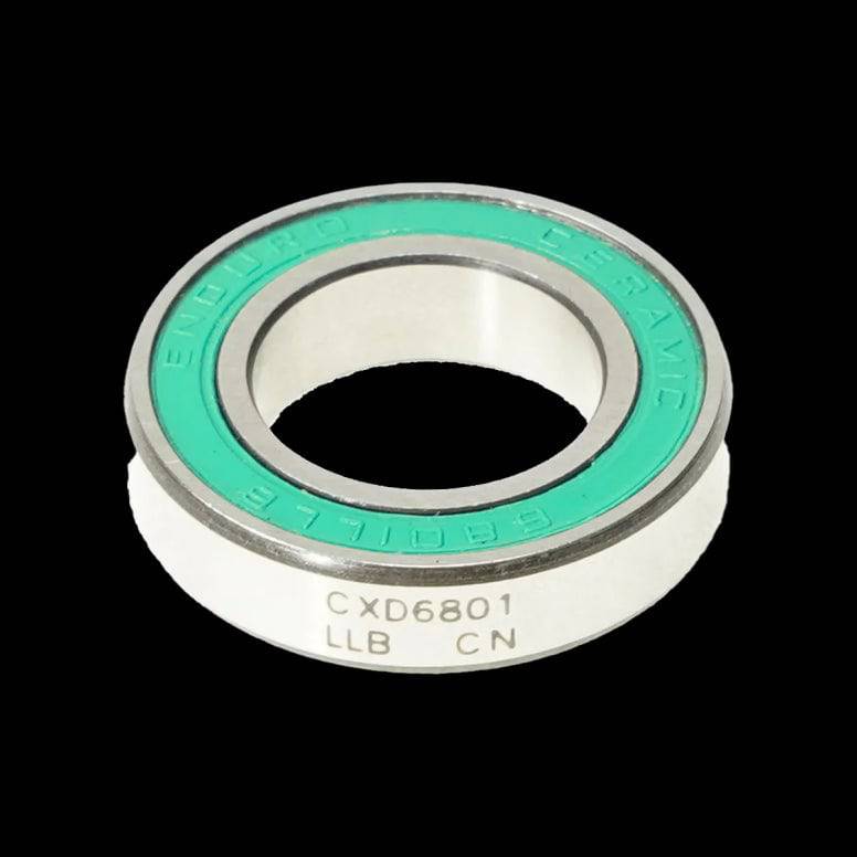 Enduro Bearings 6801 LLB CXD-15 angular contact bearing for bicycle hubs and bottom brackets, shown close-up in the image.