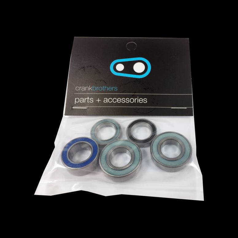 Crankbrothers Synthesis Rear Bearing Kit for i9 MS hub, high-performance replacement components, showing bearings and installation parts.
