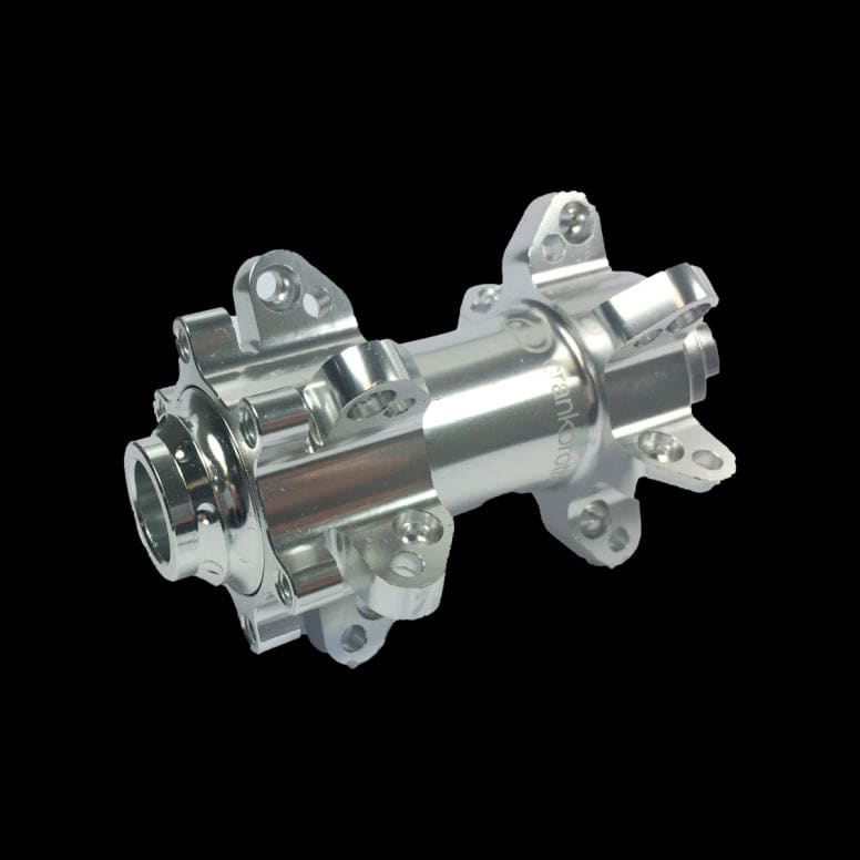 Crankbrothers Cobalt front wheel hub with 15mm axle in silver, showcasing durable cycling component with detailed design.