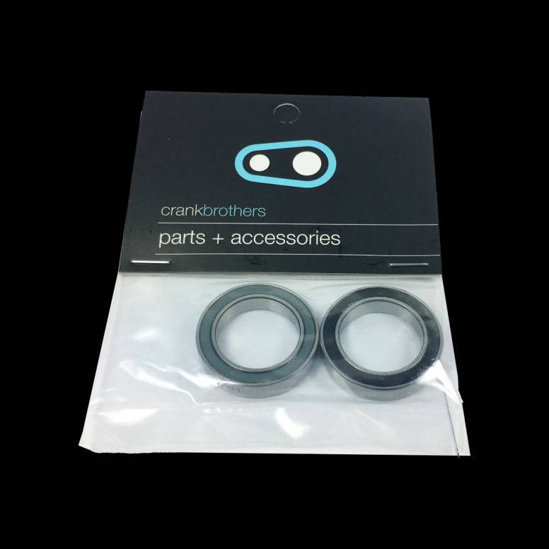 Crankbrothers Synthesis front hub bearing kit for smooth wheel performance, showing bearing components and packaging.