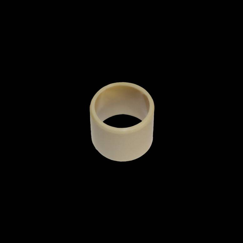 Cane Creek CCDB IGUS 15mm bushing for rear shock suspension component, showing the durable replacement part with IGUS material.
