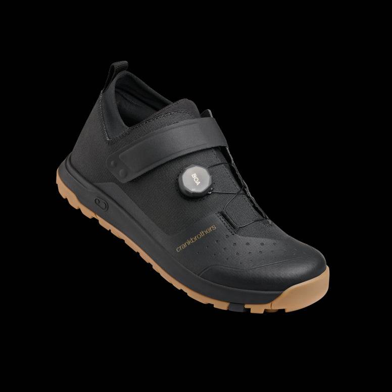 Crankbrothers Stamp Trail Boa mountain bike shoes in black and gold, size 14, with breathable upper and rugged sole for trail riding.