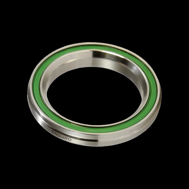 Enduro Bearings ACB 1125 stainless steel angular contact bearing for bottom brackets, showing the compact metal bearing with precise design.