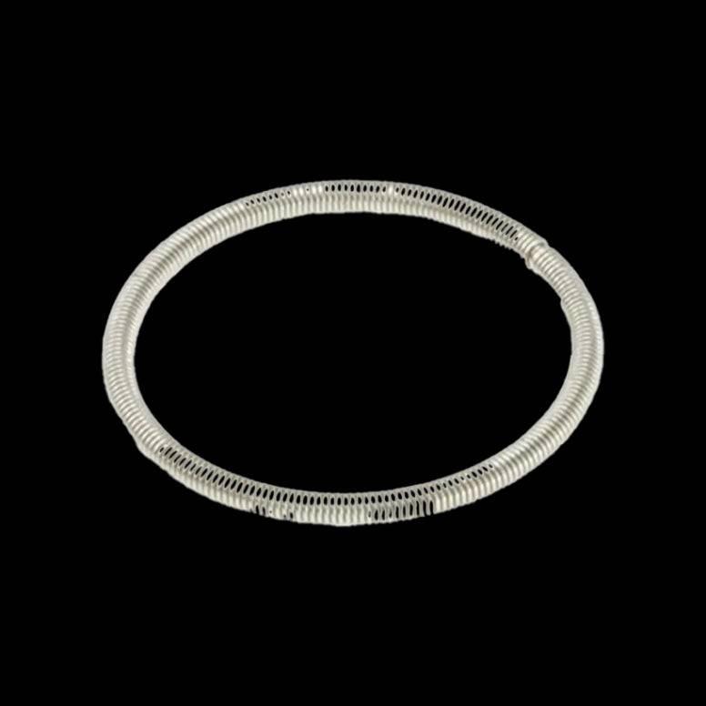 Enduro Bearings BRT-002 replacement spring for collet bottom bracket assembly, showing a small metal spring component.