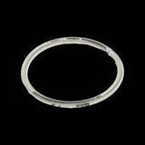 Enduro Bearings BRT-002 replacement spring for collet bottom bracket assembly, showing a small metal spring component.