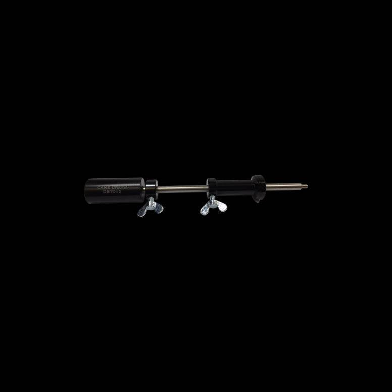 Cane Creek DB IFP setting tool for precise rear shock suspension adjustment, showing the specialized component and tool in use.