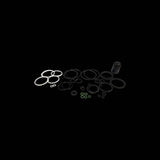 Cane Creek Kitsuma Air rear shock rebuild kit with replacement components for 100-hour maintenance, shown with internal parts.