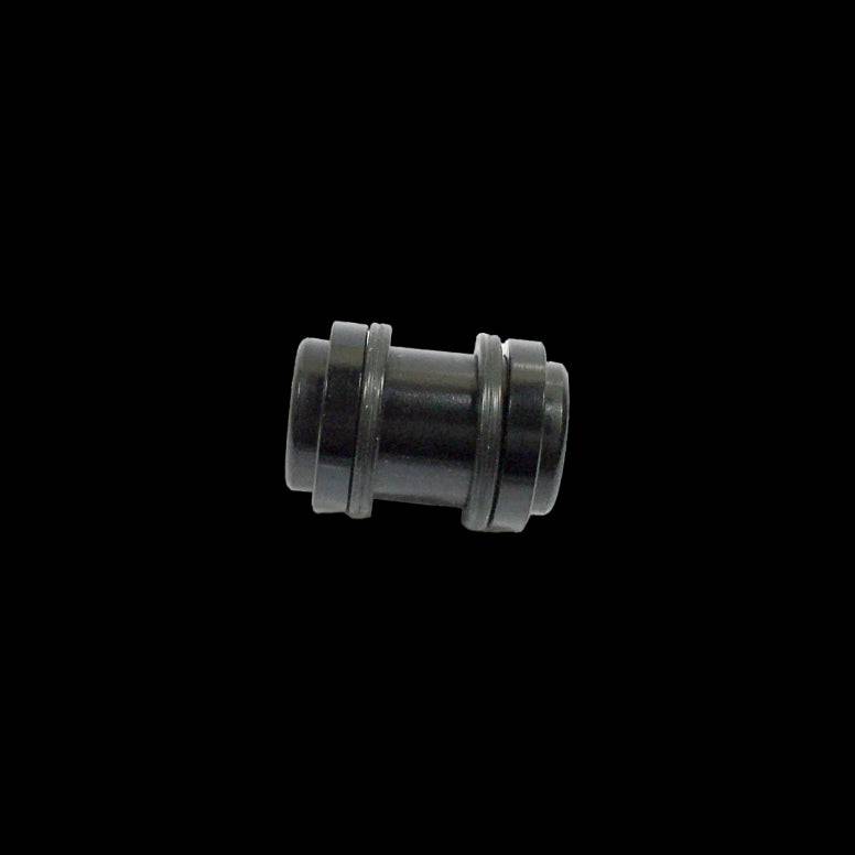Cane Creek Double Barrel damper mounting hardware for rear shock, showing metal components and mounting brackets.