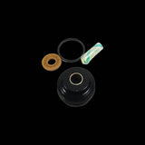 Cane Creek DB Coil rear shock oil rebuild kit for bike suspension maintenance and performance, includes components for shock repair.