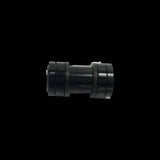 Cane Creek Double Barrel damper mounting hardware for rear shock, showing detailed metal components and assembly parts.