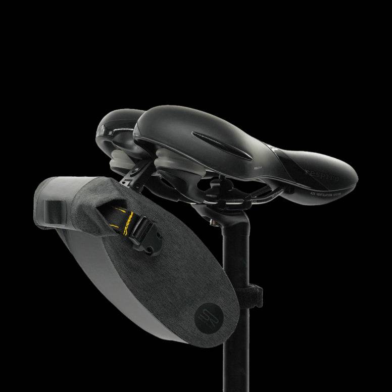 Selle Royal saddle bag with integrated clip system for durable bike storage, shown attached under bike seat.