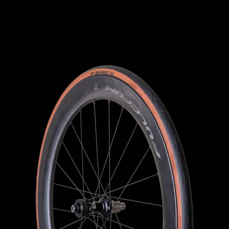 Pirelli P ZERO Race TLR RS Classic SpeedCORE SmartEVO2 tubeless ready 700c cycling tire with sleek black sidewalls and tread pattern.