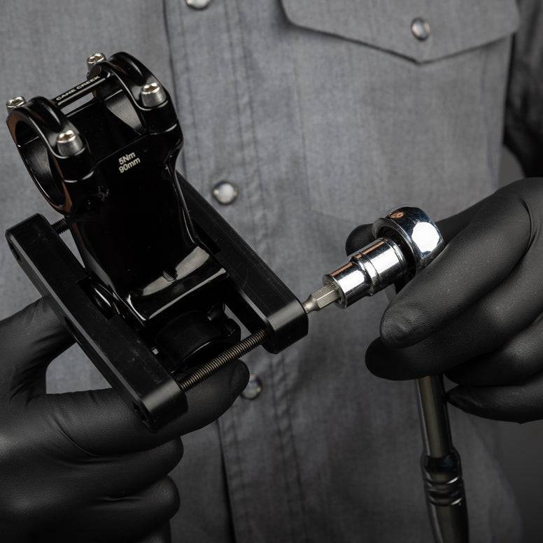 Cane Creek eeSilk Stem Service Tool in black for stem axle and bushing maintenance, used in bike workshop settings.