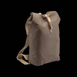 Brooks Pickwick roll-top backpack with laptop sleeve, ideal for urban cycling and commuting, featuring durable accessories and adjustable straps.