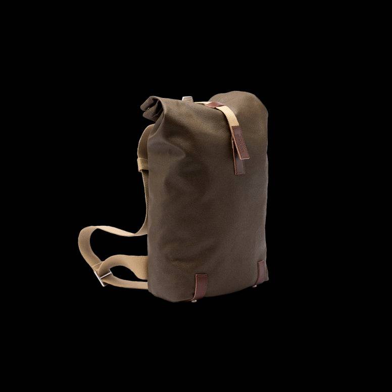 Brooks Pickwick roll-top backpack with laptop sleeve, ideal for urban cycling and commuting, featuring durable outdoor accessories design.