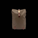 Brooks Pickwick roll-top backpack with laptop sleeve, urban cycling and commuting accessory, durable design in black with adjustable straps.