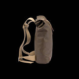Brooks Pickwick roll-top backpack with laptop sleeve, designed for urban cycling and commuting, featuring durable accessories and adjustable straps.