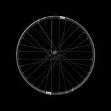 Crankbrothers Synthesis E11 Carbon MTB rear wheel for mountain bikes, showing lightweight carbon rim and durable hub components.