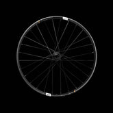Crankbrothers Synthesis E11 Carbon front wheel with Hydra Hub for enduro and trail riding, showcasing lightweight carbon rim and hub details.