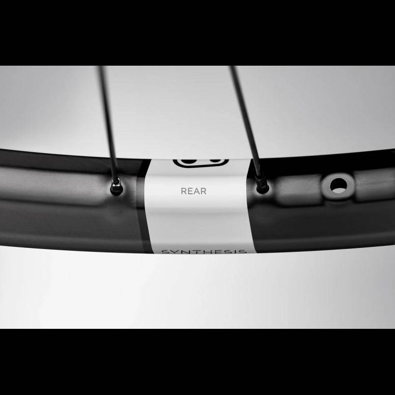 Crankbrothers Synthesis Enduro Carbon Rear Wheel with Industry Nine 1/1 hub, lightweight mountain bike component, close-up view