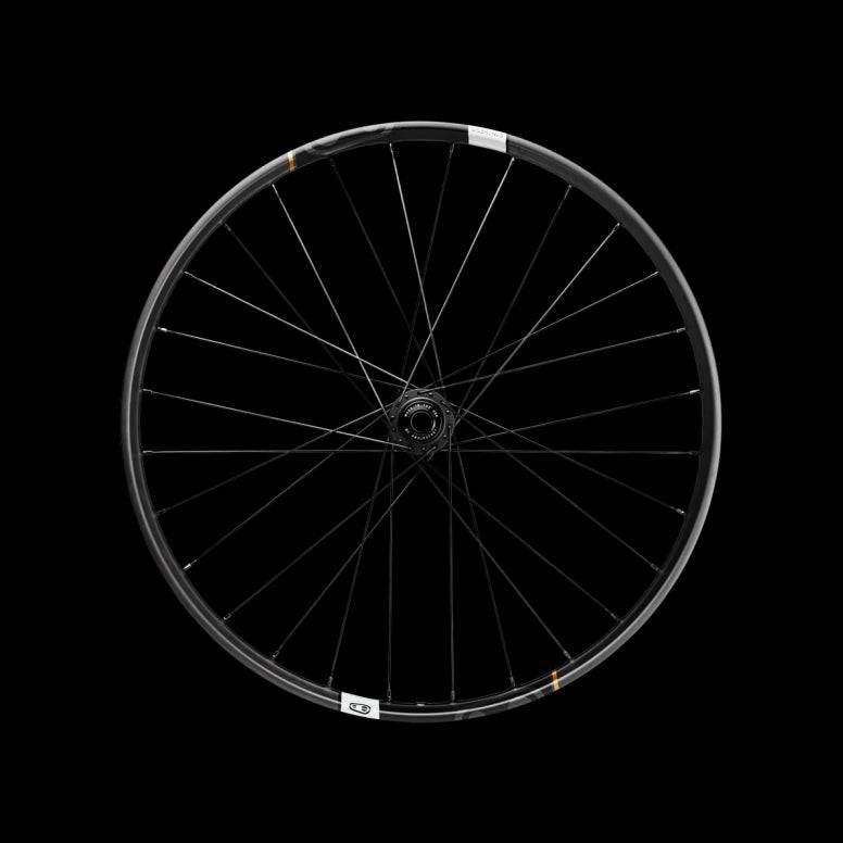 Crankbrothers Synthesis DH11 carbon front wheel for downhill mountain bike racing, showcasing lightweight construction and sleek design.