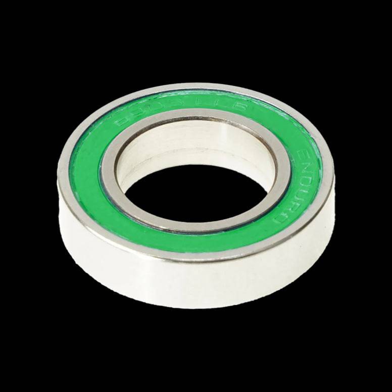 Enduro Bearings 6903 2RS stainless steel sealed ABEC 3 cycling bearing showing the sealed metal casing and bearing rollers.