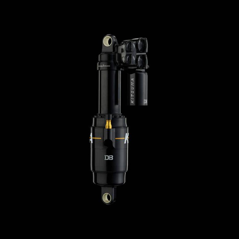 Cane Creek G2 Kitsuma Air Shock for downhill mountain bike, showing adjustable suspension components on a mountain bike.