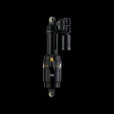 Cane Creek G2 Kitsuma Air Shock for downhill mountain bike, showing adjustable suspension components on a mountain bike.