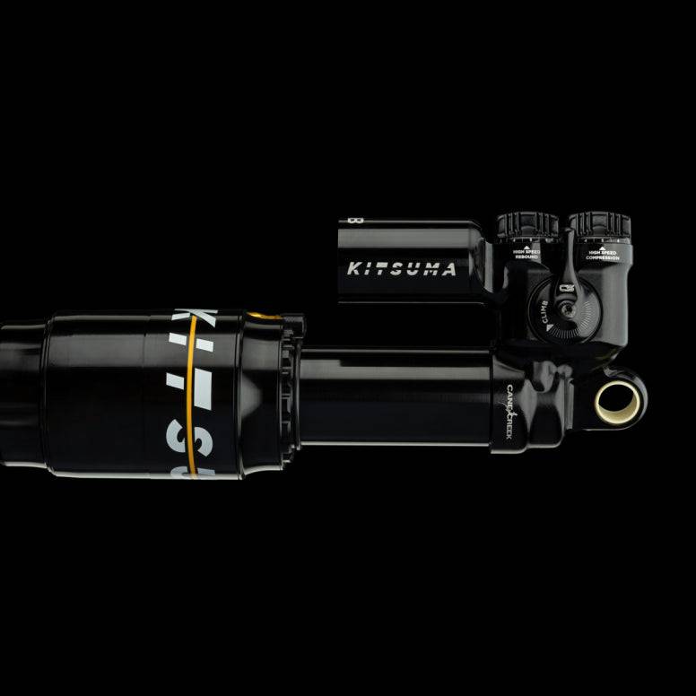 Cane Creek G2 Kitsuma Air Shock for downhill mountain bike, adjustable suspension component, shown in a close-up image.