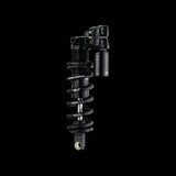 Cane Creek G2 Kitsuma Coil Trunnion Shock for downhill mountain bikes, showing the coil spring and shock body with mounting hardware.