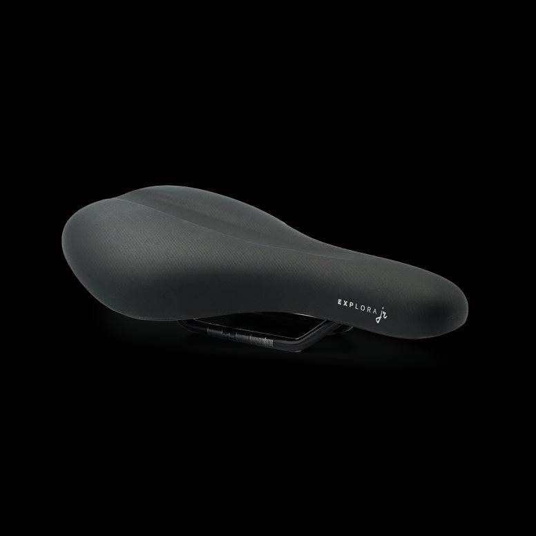 Selle Royal Explora Junior bike saddle with waterproof cover, comfortable design, and clip system for children's bicycles.