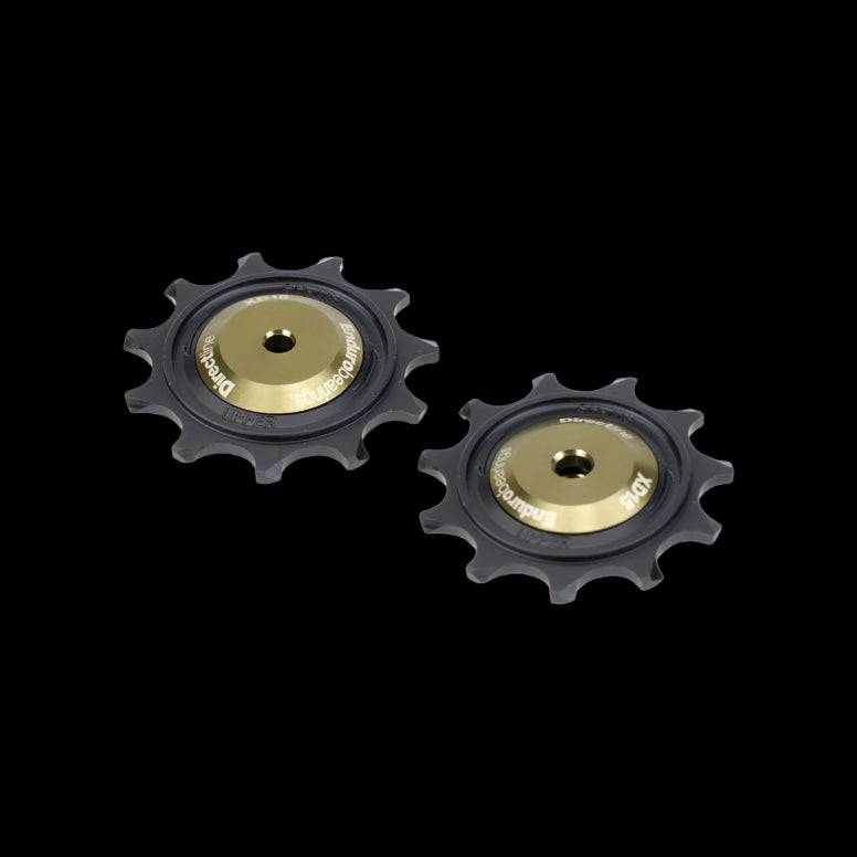 Enduro Bearings XD15 ceramic-hybrid pulley wheels for Shimano Dura Ace 12-speed, black and green, component bike upgrade.
