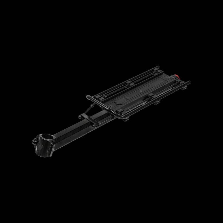Topeak MTX Beam Rack attached to 29-inch mountain bike with QuickTrack system, mounted on the bike's rear rack.