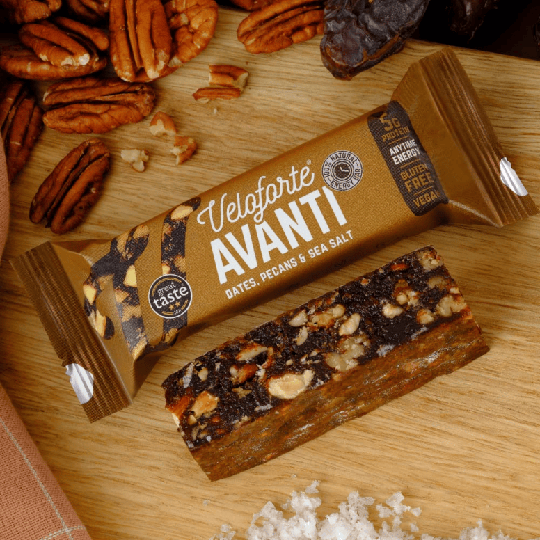 Veloforte gluten-free vegan energy bar with plant-based protein and carbs, showing the bar's packaging and ingredients.