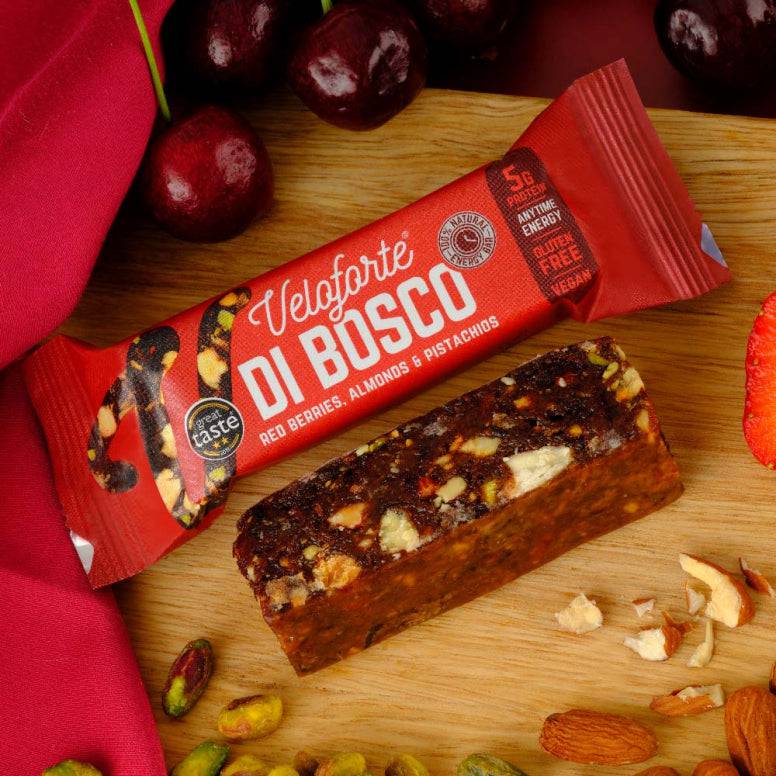 Veloforte gluten-free vegan energy bars with plant-based protein and carbs, displayed on a clean surface.