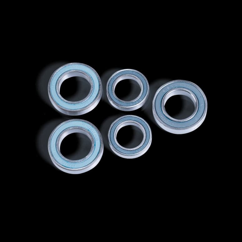 Crankbrothers Synthesis rear bearing kit for Industry Nine XD/HG hubs, showing bearings and components for bike hub maintenance.
