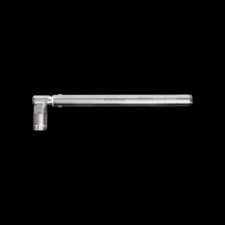Topeak Torq Wrench 40Nm with freewheel lockring tool in silver, displayed on a workshop bench.