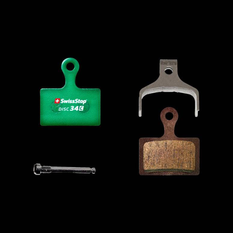 SwissStop Disc 34 brake pads for Shimano road bikes, compatible with Dura Ace, Ultegra, and 105 Green Disc C components.