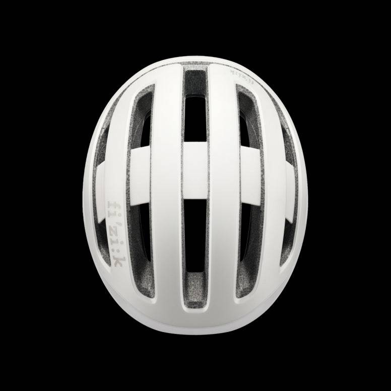 Fizik Kudo cycling helmet with MIPS, ventilation, and rear light, designed for safety and comfort during bike rides.
