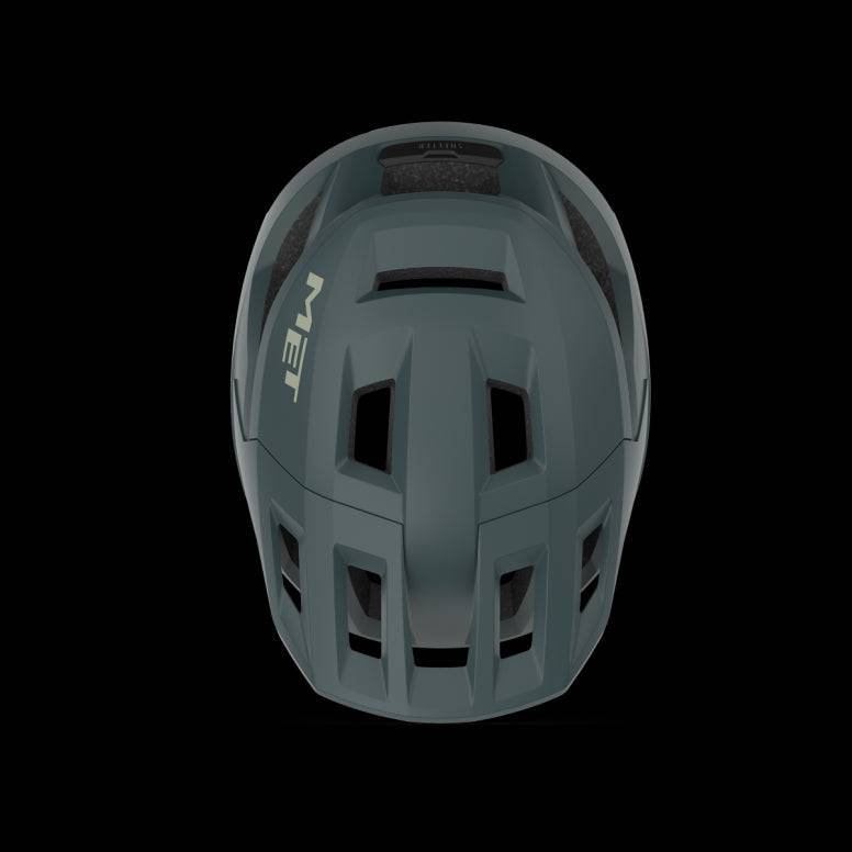 MET Shelter MTB helmet with Safe-T Sport Fit System and ventilation, shown in a natural outdoor setting.