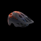 MET Revo Mips MTB helmet with advanced ventilation and safety features, showcasing the helmet's aerodynamic design and secure fit.