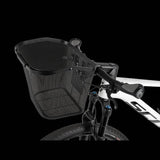 Topeak Urban Basket Front in black with QuickClick® system attached to a bike handlebar for convenient storage.