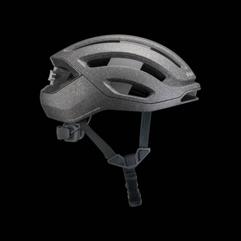 Fizik Kudo cycling helmet with MIPS, ventilation, and rear light, designed for safety and comfort during bike rides.