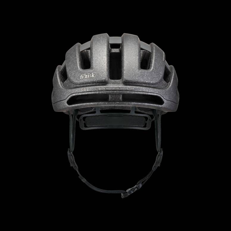 Fizik Kudo cycling helmet with MIPS, ventilation, and rear light, designed for safety and airflow during bike rides.