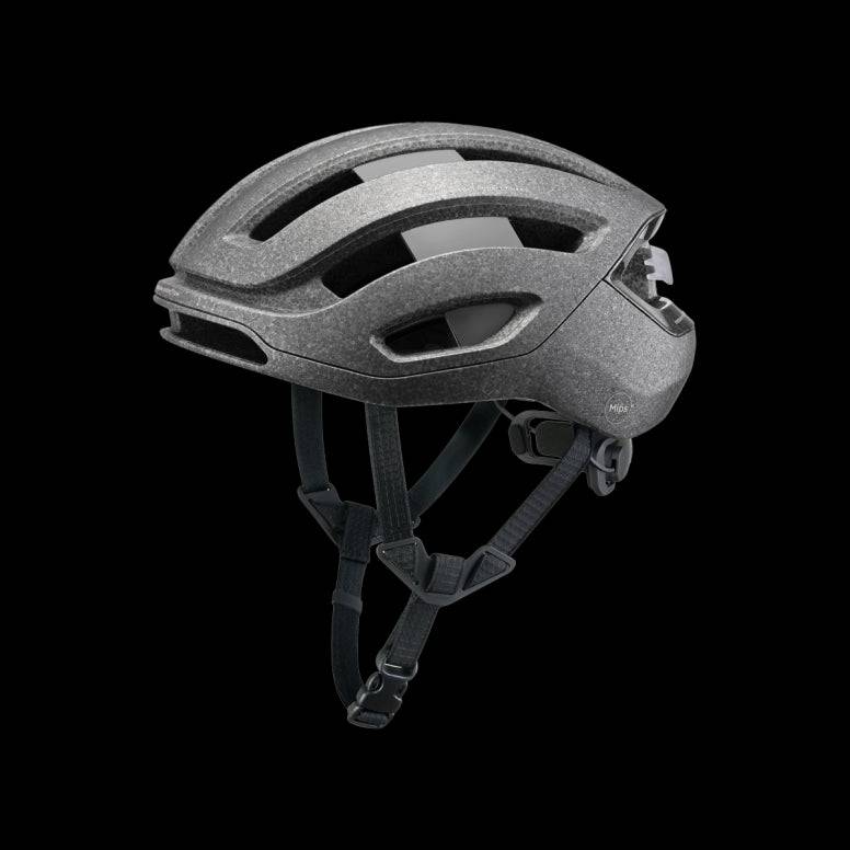 Fizik Kudo cycling helmet with MIPS Air Node, ventilation, rear light, lightweight design, and secure fit for safe biking.