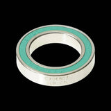 Enduro Bearings 6803 LLB CXD-15 ceramic bike bearing, 17x26x5mm, for bottom brackets and hubs, showing the bearing in a bike component.