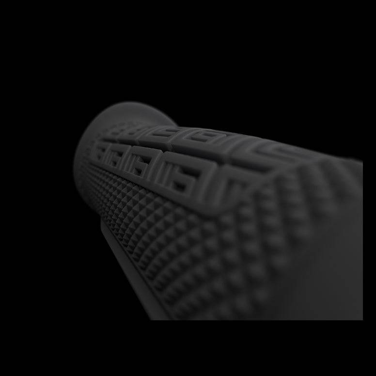 Ergon GDH Team MTB grips with ergonomic design and secure locking stops, shown on a mountain bike handlebar.