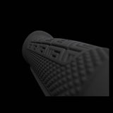 Ergon GDH Team MTB grips with ergonomic design and secure locking stops, shown on a mountain bike handlebar.