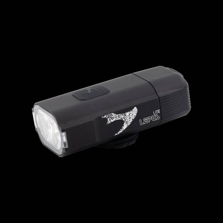 Moon Sport LEPUS LITE black bike front light with USB-C rechargeable design, 400 lumens, mounted on a bicycle in outdoor setting.